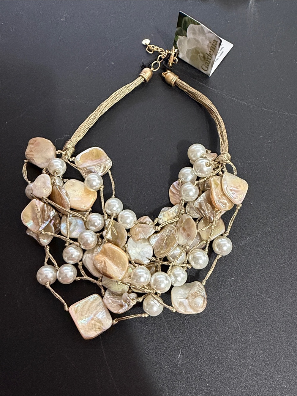 Gardenia iridescent shells and faux pearl necklace